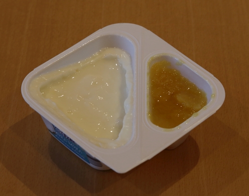 Müller Joghurt mit der Ecke Bora Bora Kokos Ananas Becher echtes Aussehen Verpackung